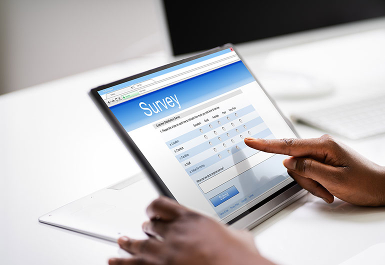 A customer takes a life science customer survey