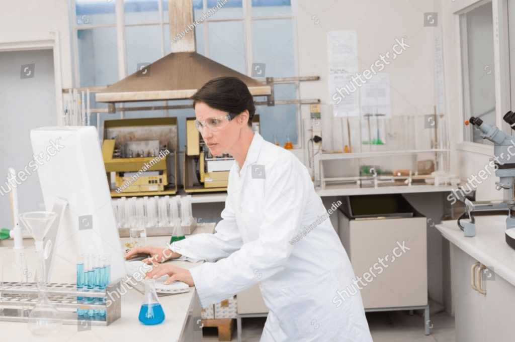 a scientist in a worn lab with glassware stored improperly and with an uncommon blue liquid inside 