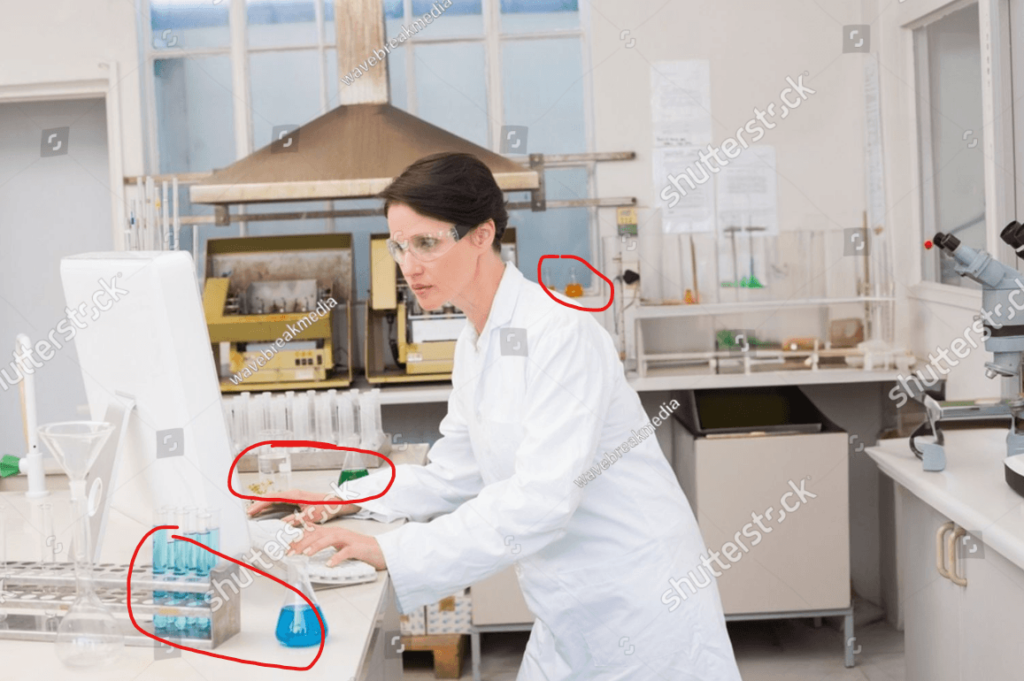 same image of a scientist in a worn lab with glassware stored improperly but with the problem areas circled in red